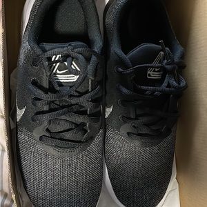 Brand new never worn still in the box womens nike running shoes size 8.5